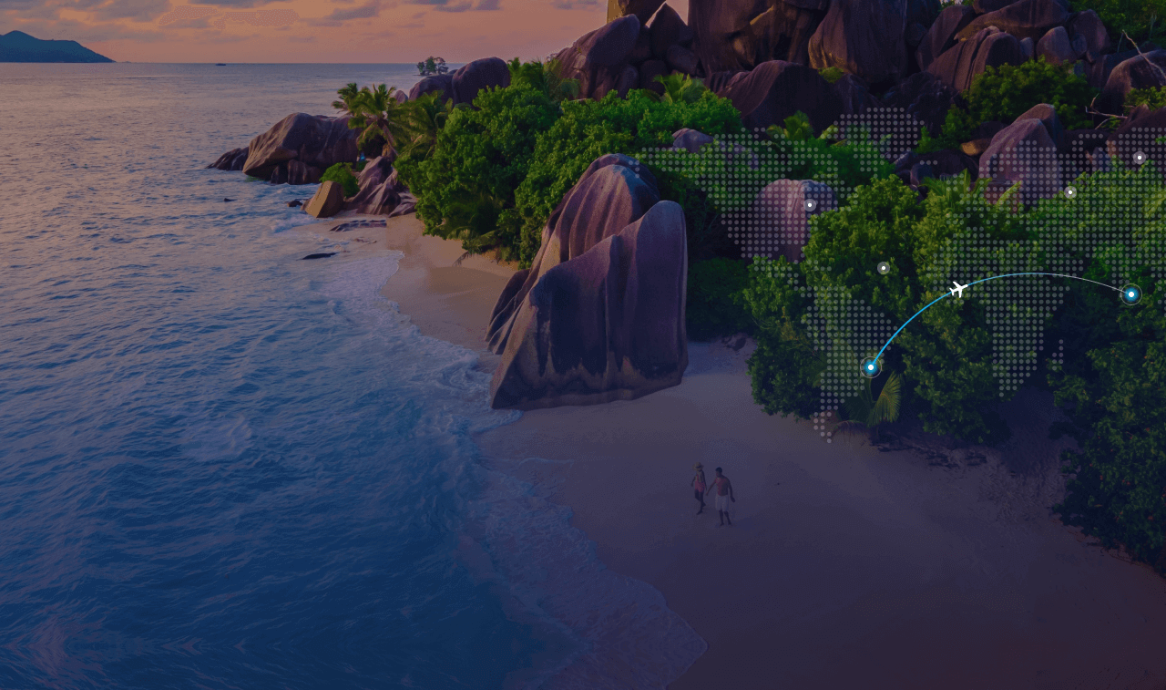 Bird-eye view of an island with people at the beach